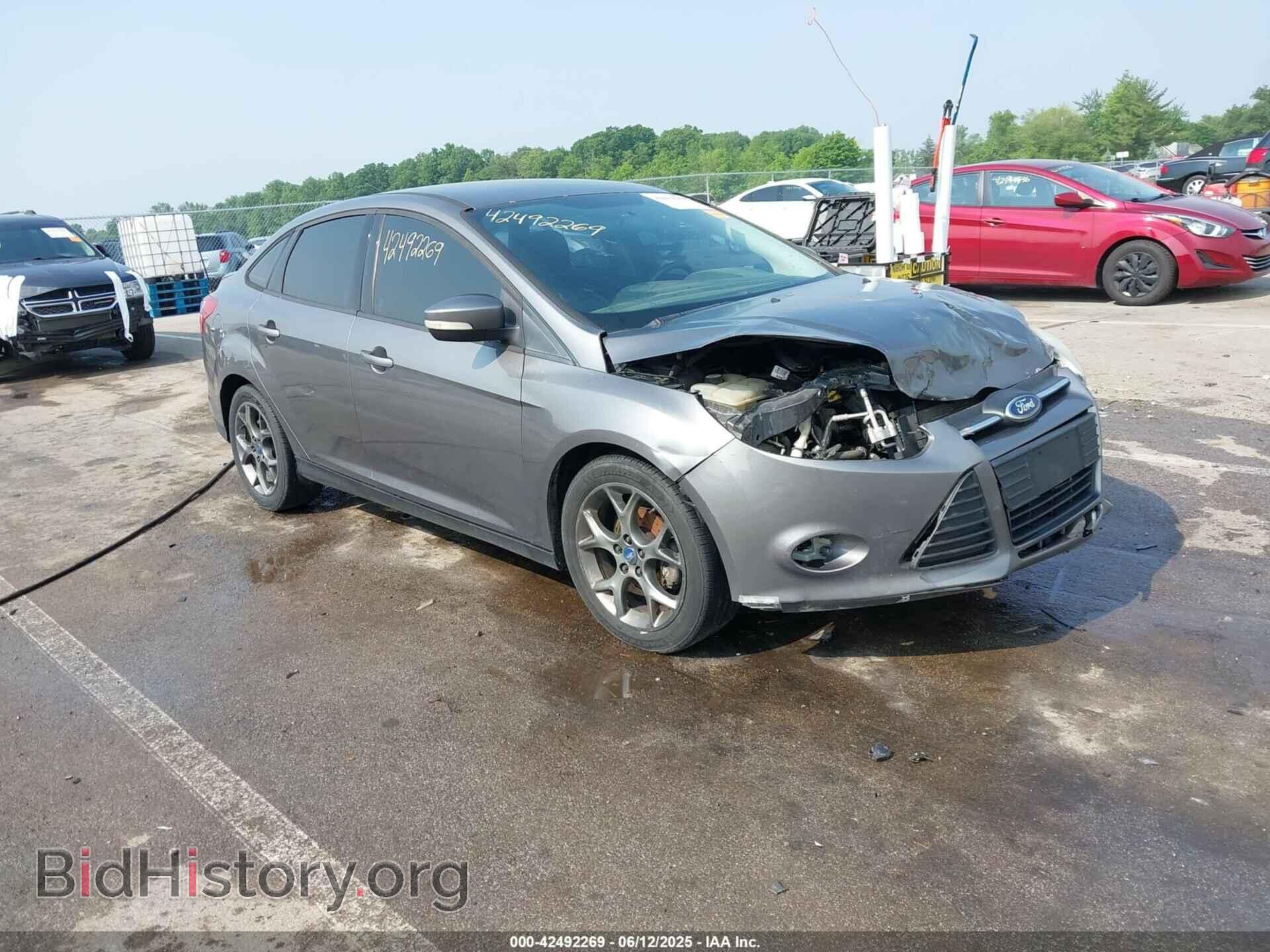 Фотография 1FADP3F25DL114125 - FORD FOCUS 2013