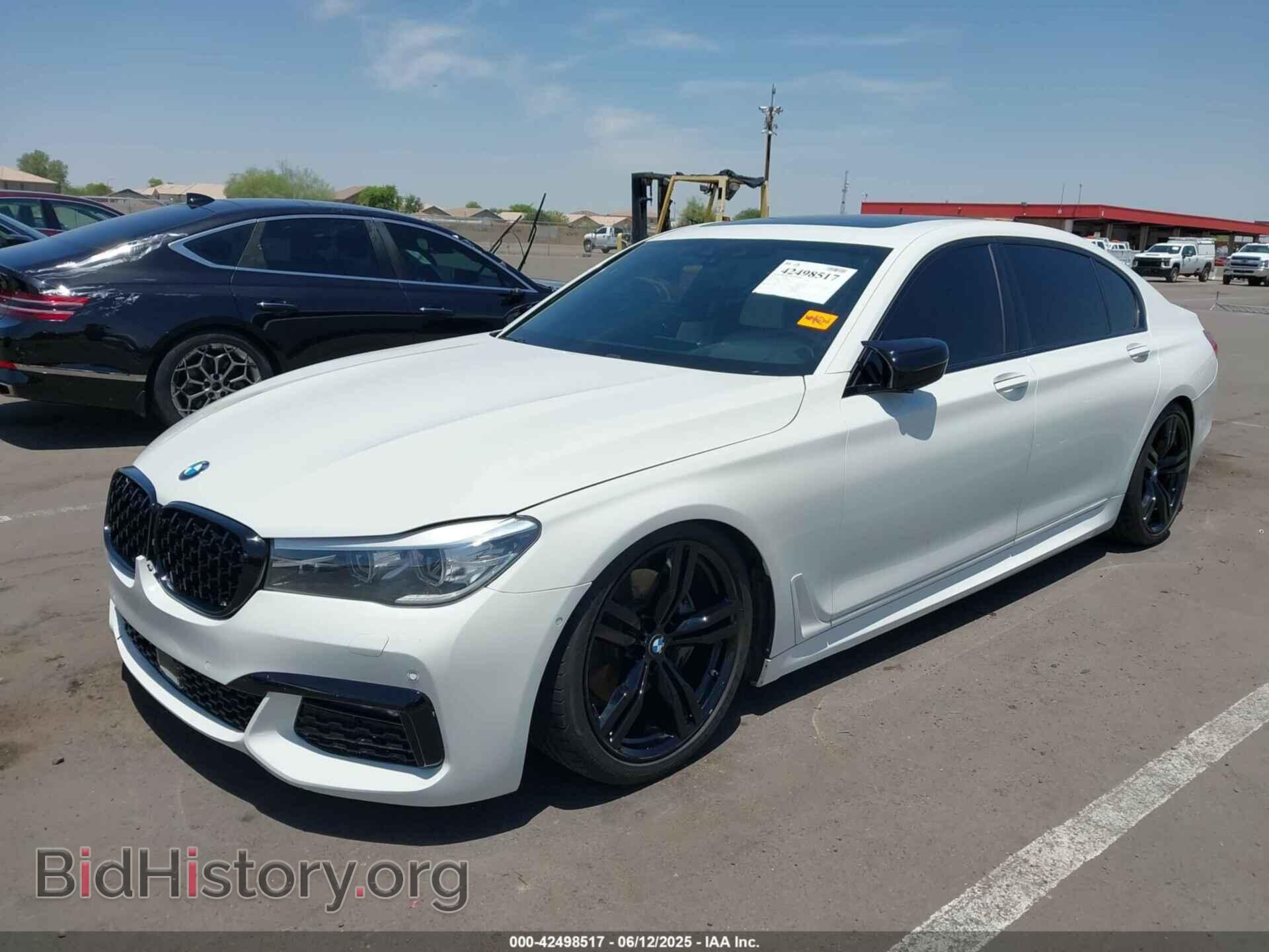2016 BMW 740I - VIN: WBA7E2C50GG504050 - Фото 2