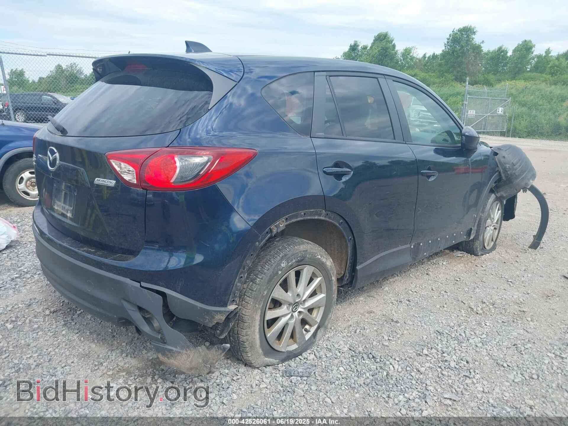 2014 MAZDA CX-5 - VIN: JM3KE4CY4E0409989 - Фото 4