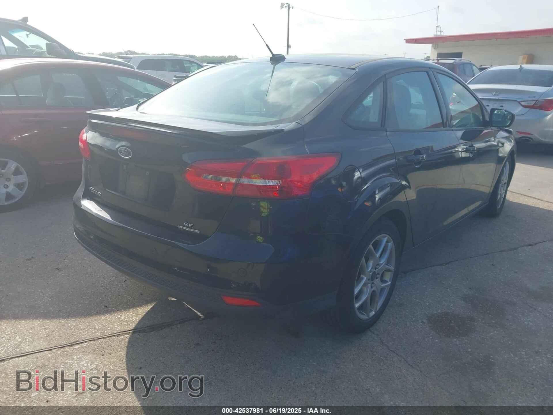 2015 FORD FOCUS - VIN: 1FADP3F29FL384591 - Photo 4