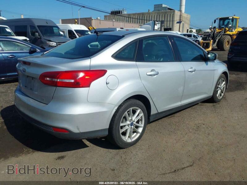 2015 Ford FOCUS (VIN 1FADP3F24FL301732) — photo 4 of 11