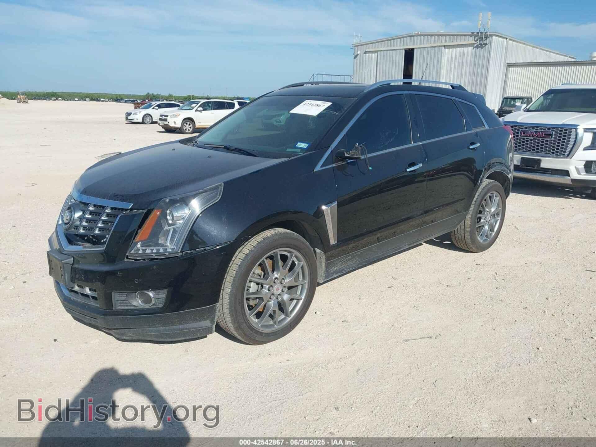2014 CADILLAC SRX - VIN: 3GYFNBE37ES548081 - Фото 2