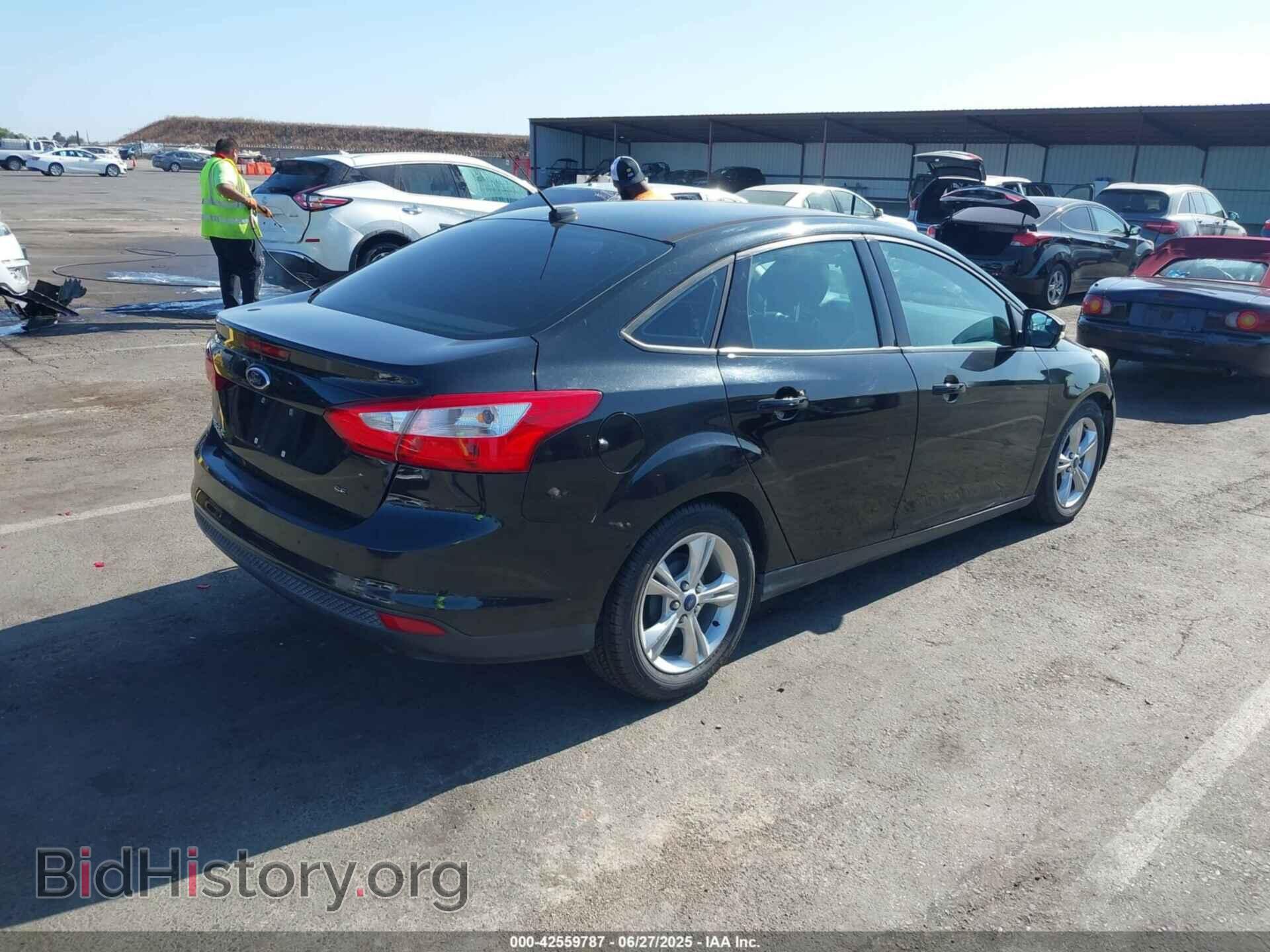 2014 FORD FOCUS - VIN: 1FADP3F20EL211024 - Photo 4