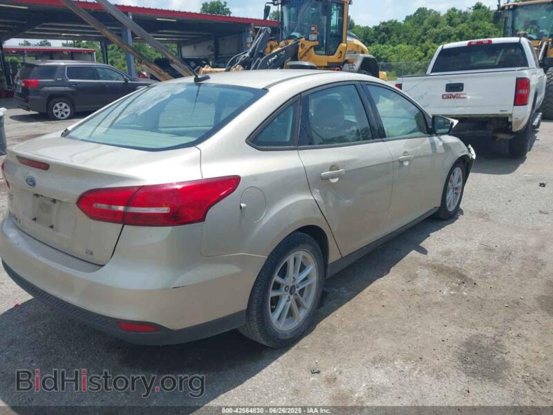 2017 Ford FOCUS (VIN 1FADP3F21HL301934) — photo 4 of 11