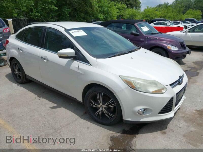 2012 Ford FOCUS SEL (VIN 1FAHP3H2XCL231504) — фото 1 из 11, IAAI, повреждение: нормальный износ