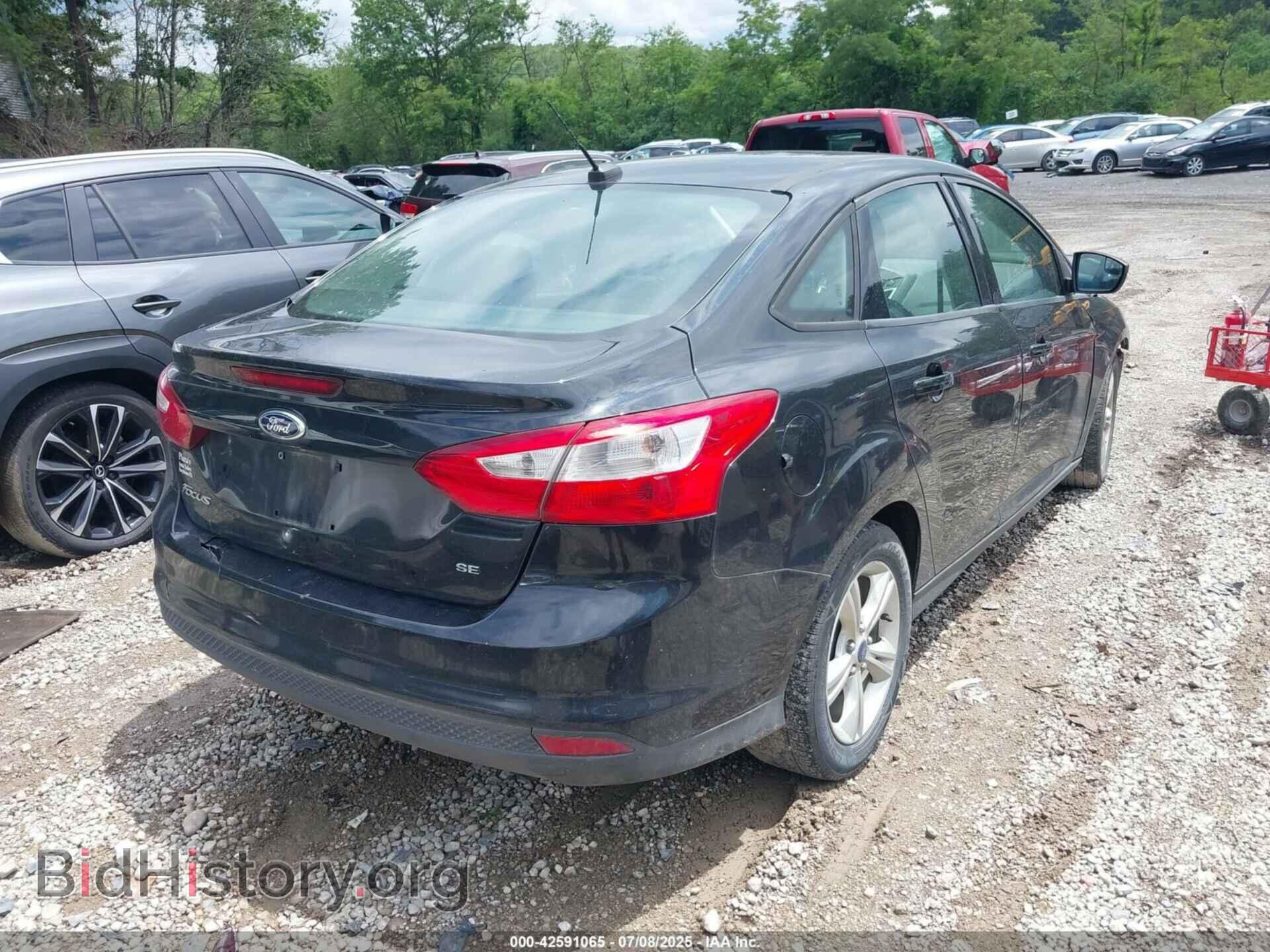 2014 FORD FOCUS - VIN: 1FADP3F28EL448392 - Photo 4