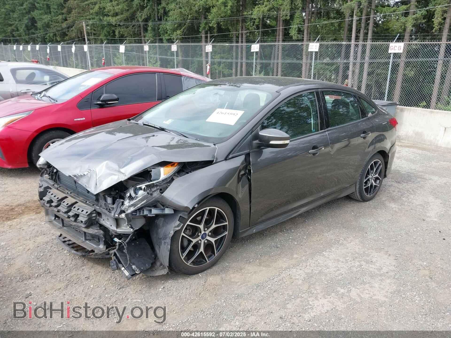 2016 FORD FOCUS - VIN: 1FADP3F22GL211075 - Фото 2