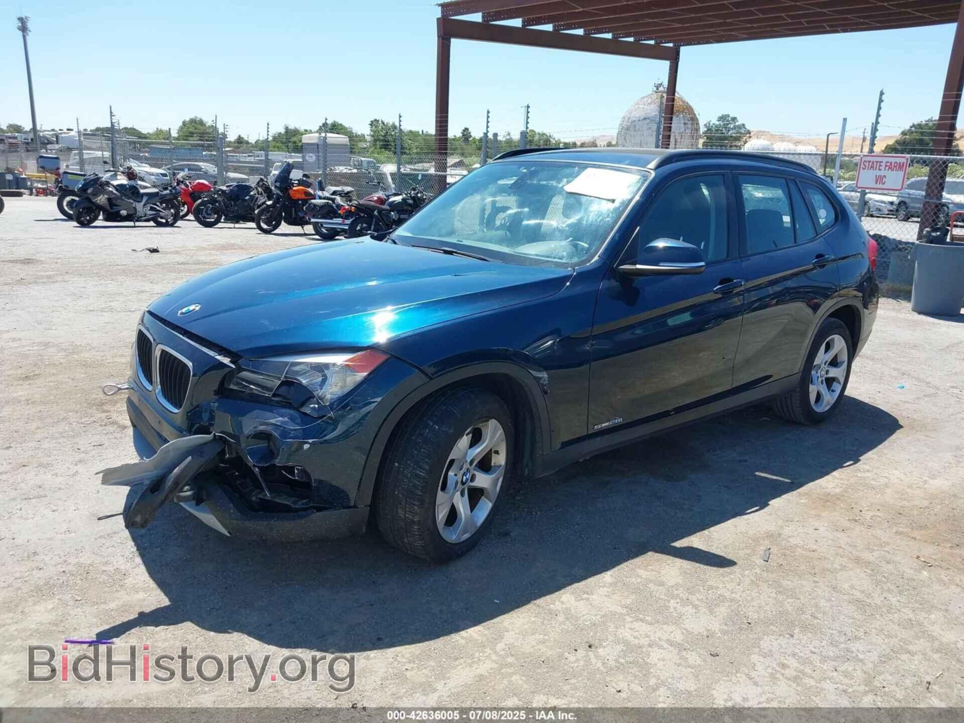 2014 BMW X1 - VIN: WBAVM1C5XEVW56432 - Фото 2