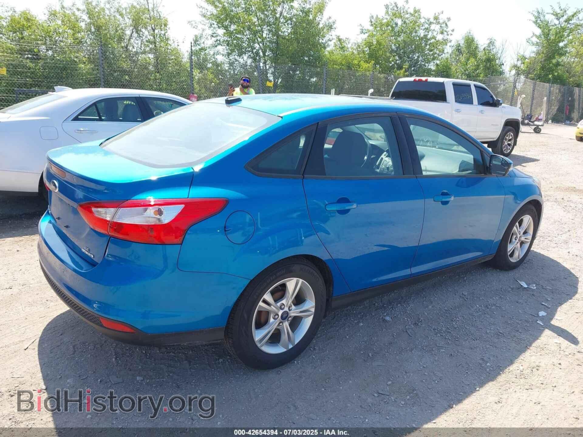 2014 FORD FOCUS - VIN: 1FADP3F20EL355303 - Photo 4