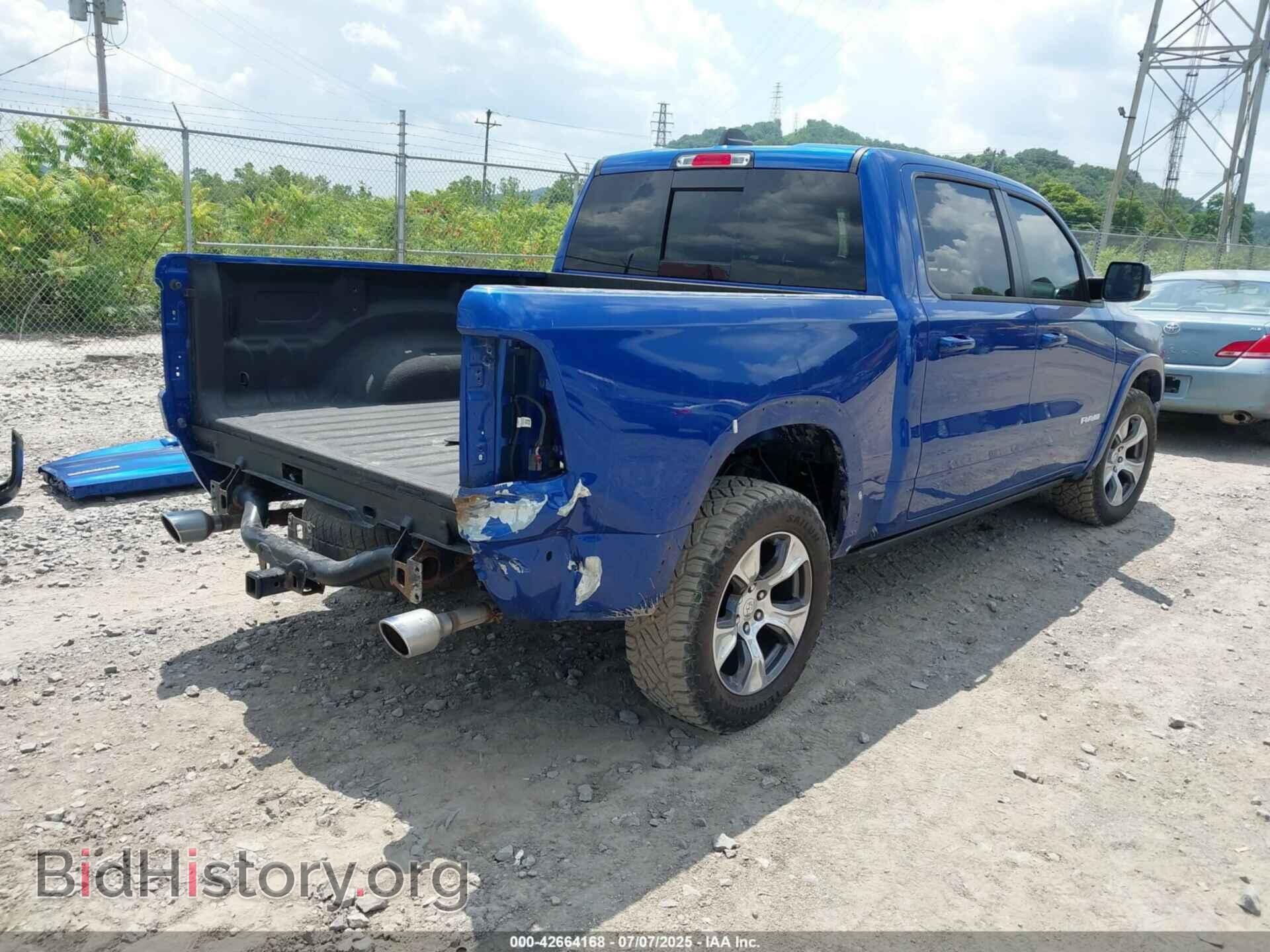 2019 RAM 1500 - VIN: 1C6SRFJT7KN589717 - Фото 4