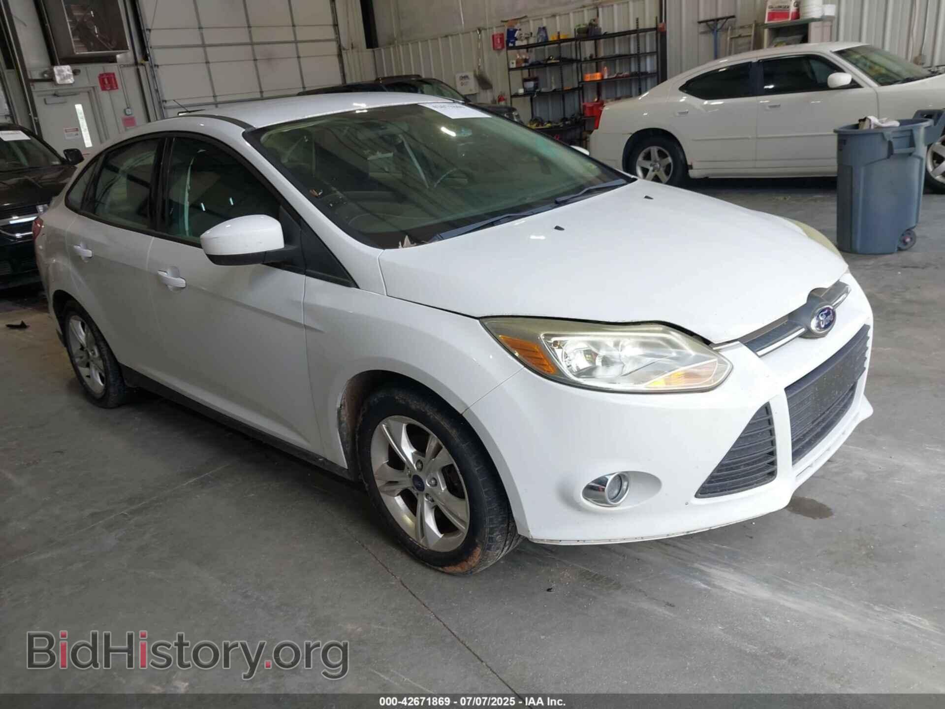 Фотография 1FAHP3F23CL404590 - FORD FOCUS 2012