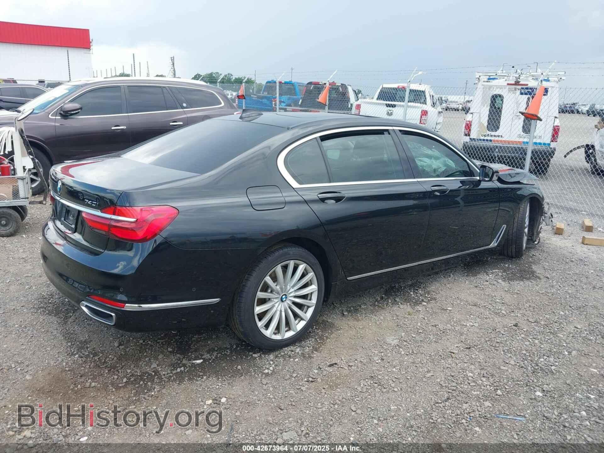 2017 BMW 740I - VIN: WBA7E4C59HGU99556 - Фото 4
