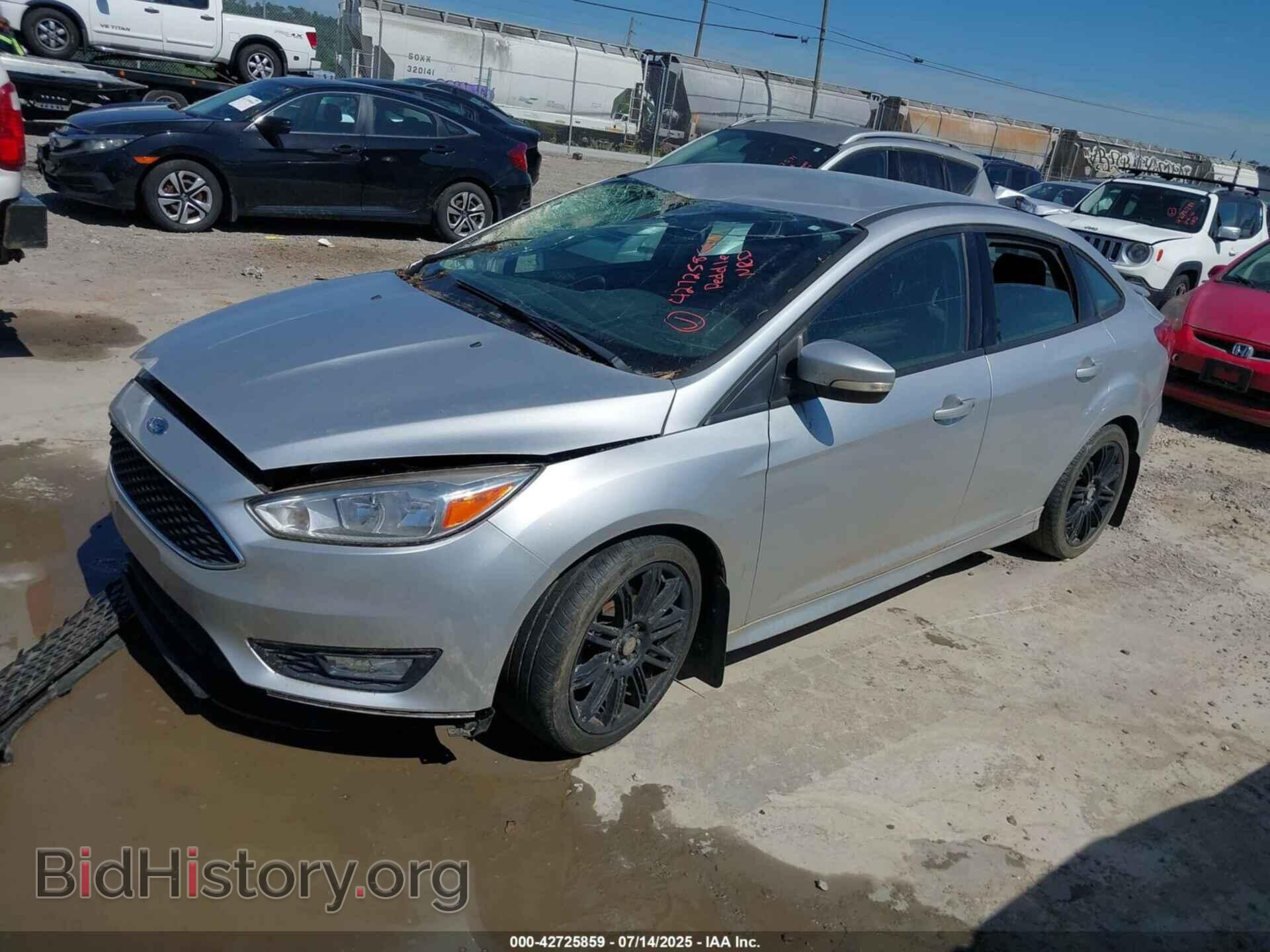 2016 FORD FOCUS - VIN: 1FADP3F26GL296597 - Фото 2