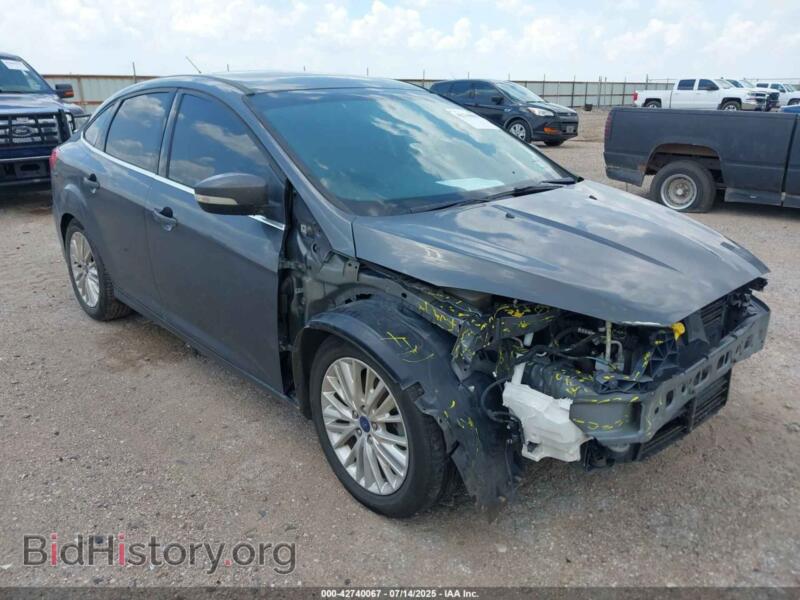 2017 Ford FOCUS Titanium (VIN 1FADP3J2XHL238629) — photo 1 of 16, IAAI, damage: front end