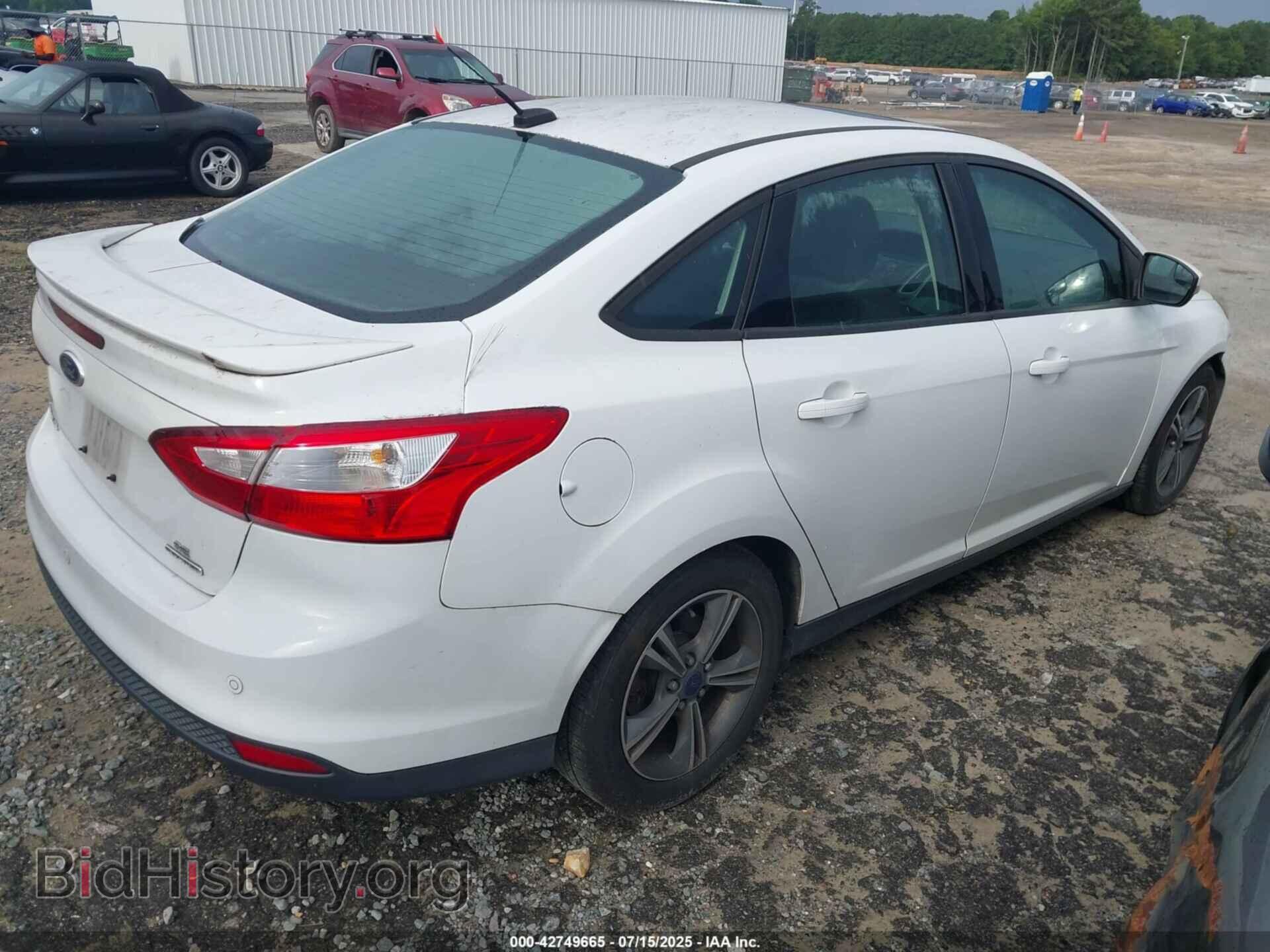 2014 FORD FOCUS - VIN: 1FADP3F24EL243863 - Photo 4