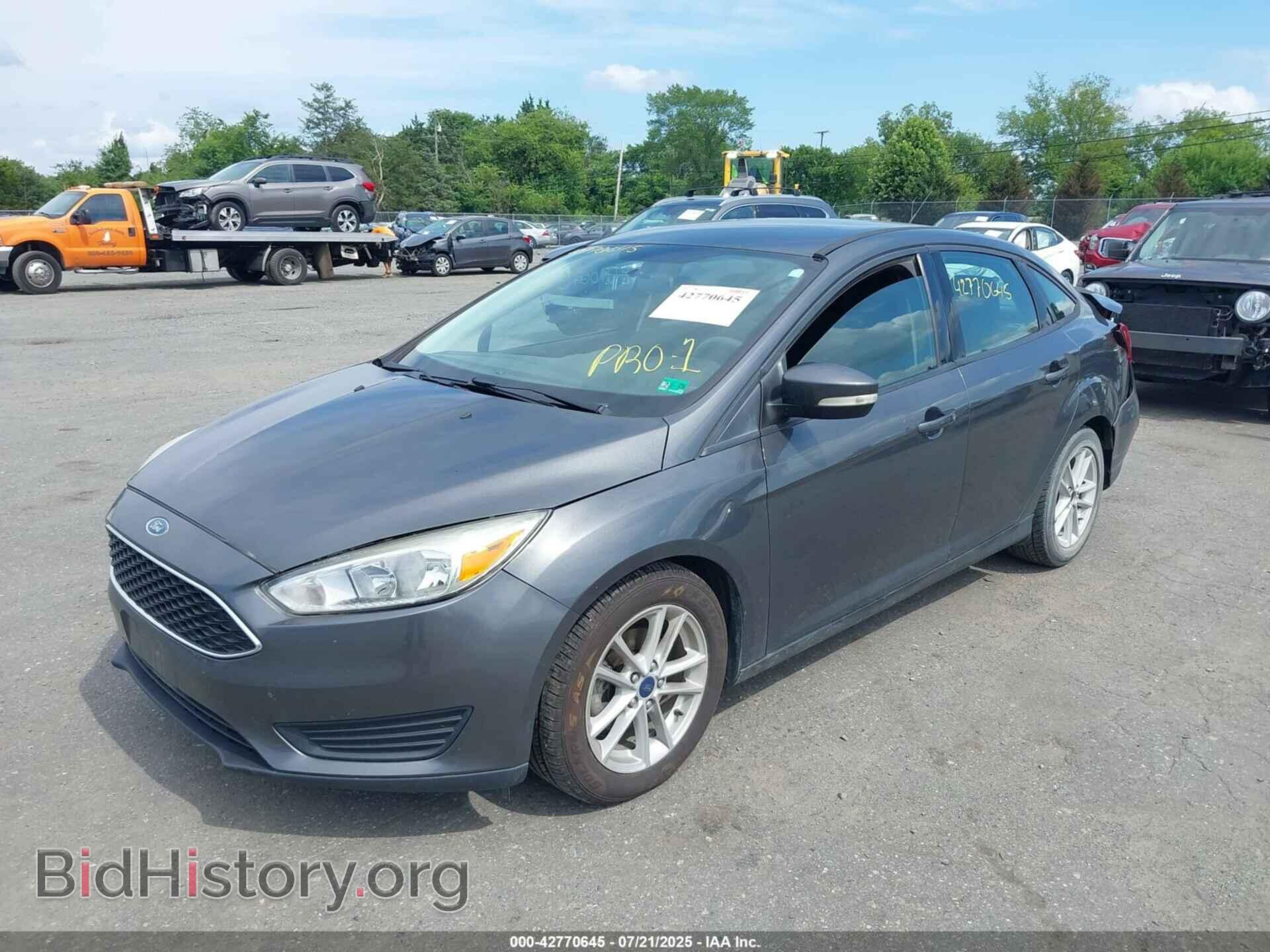 2016 FORD FOCUS - VIN: 1FADP3F29GL402850 - Фото 2