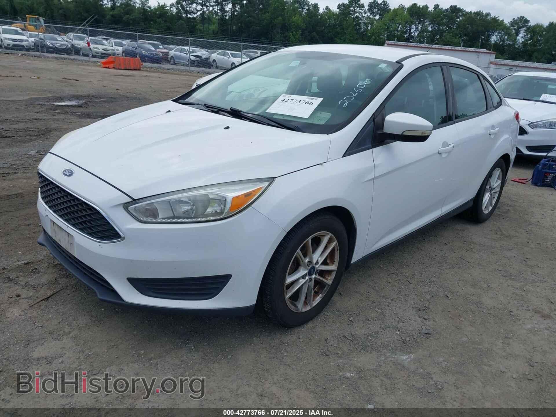 2016 FORD FOCUS - VIN: 1FADP3F23GL402813 - Фото 2