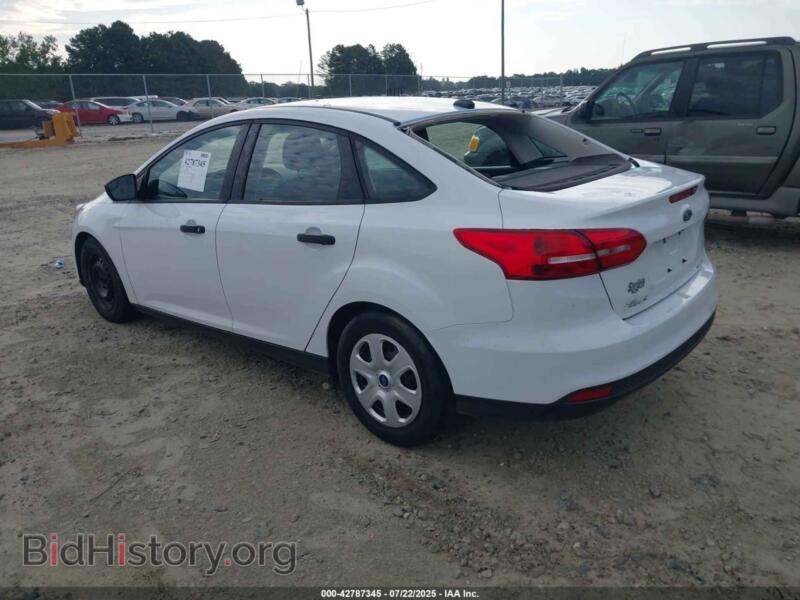 2016 Ford FOCUS (VIN 1FADP3E27GL371115) — фото 3 из 19