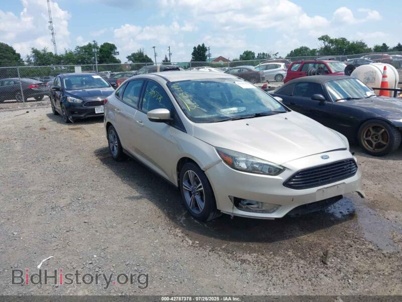 2017 Ford FOCUS SE (VIN 1FADP3FE2HL309728) — photo 1 of 17, IAAI, damage: front end