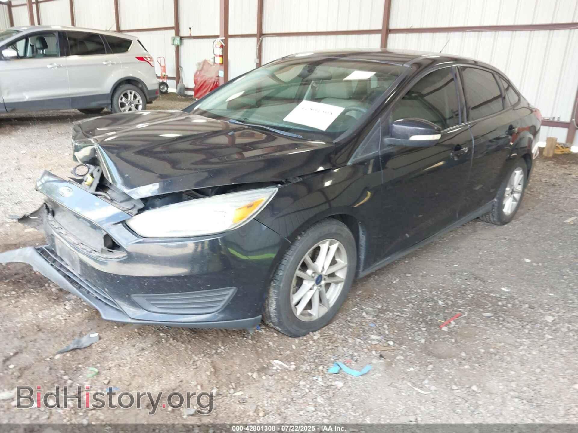 2016 FORD FOCUS - VIN: 1FADP3F29GL304403 - Фото 2