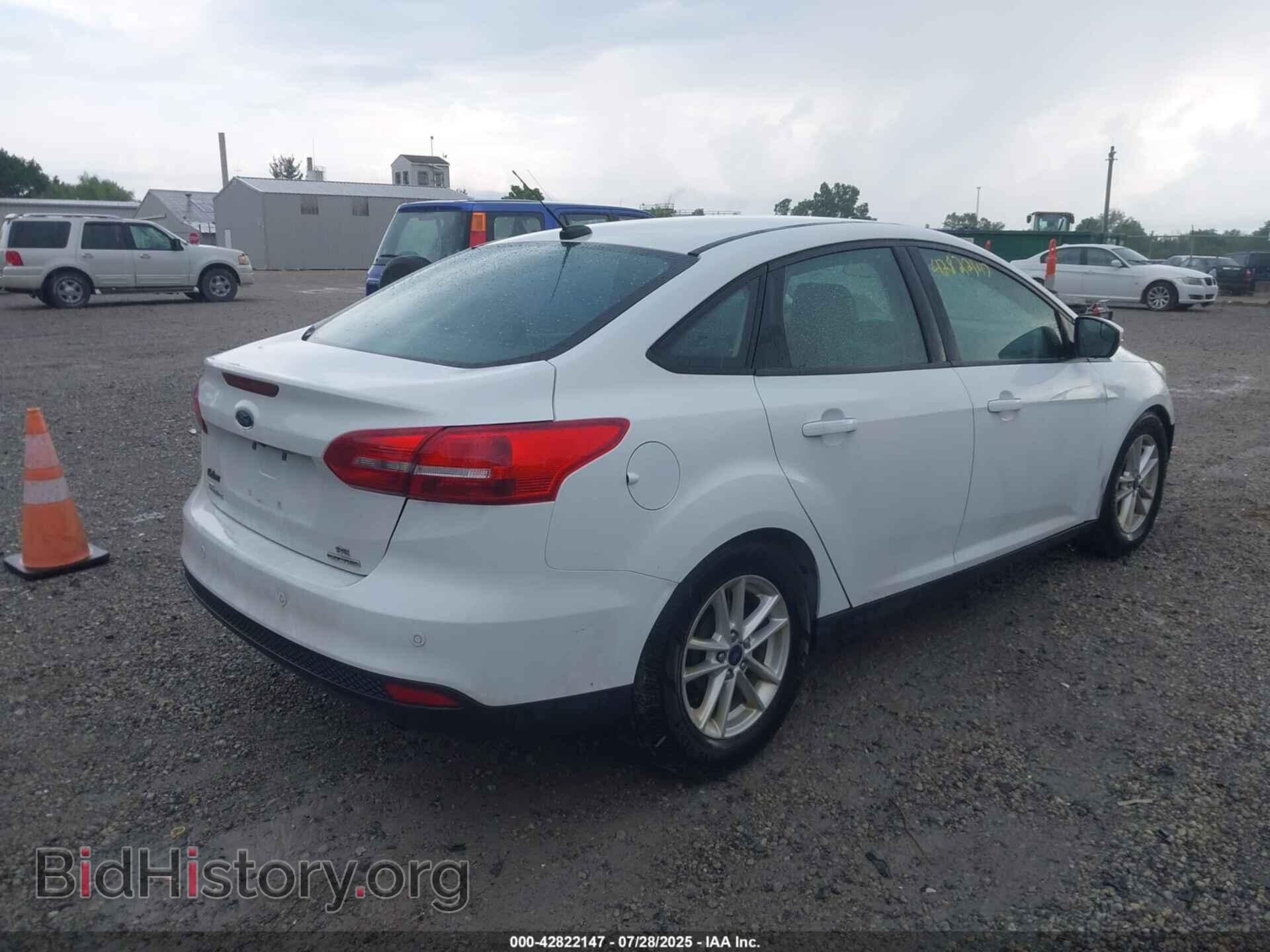2016 FORD FOCUS - VIN: 1FADP3F21GL390662 - Photo 4