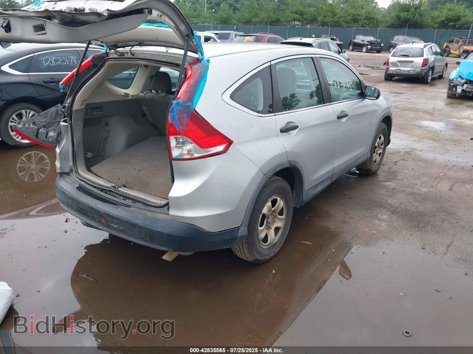 2014 HONDA CR-V - VIN: 3CZRM3H38EG710062 - Фото 4