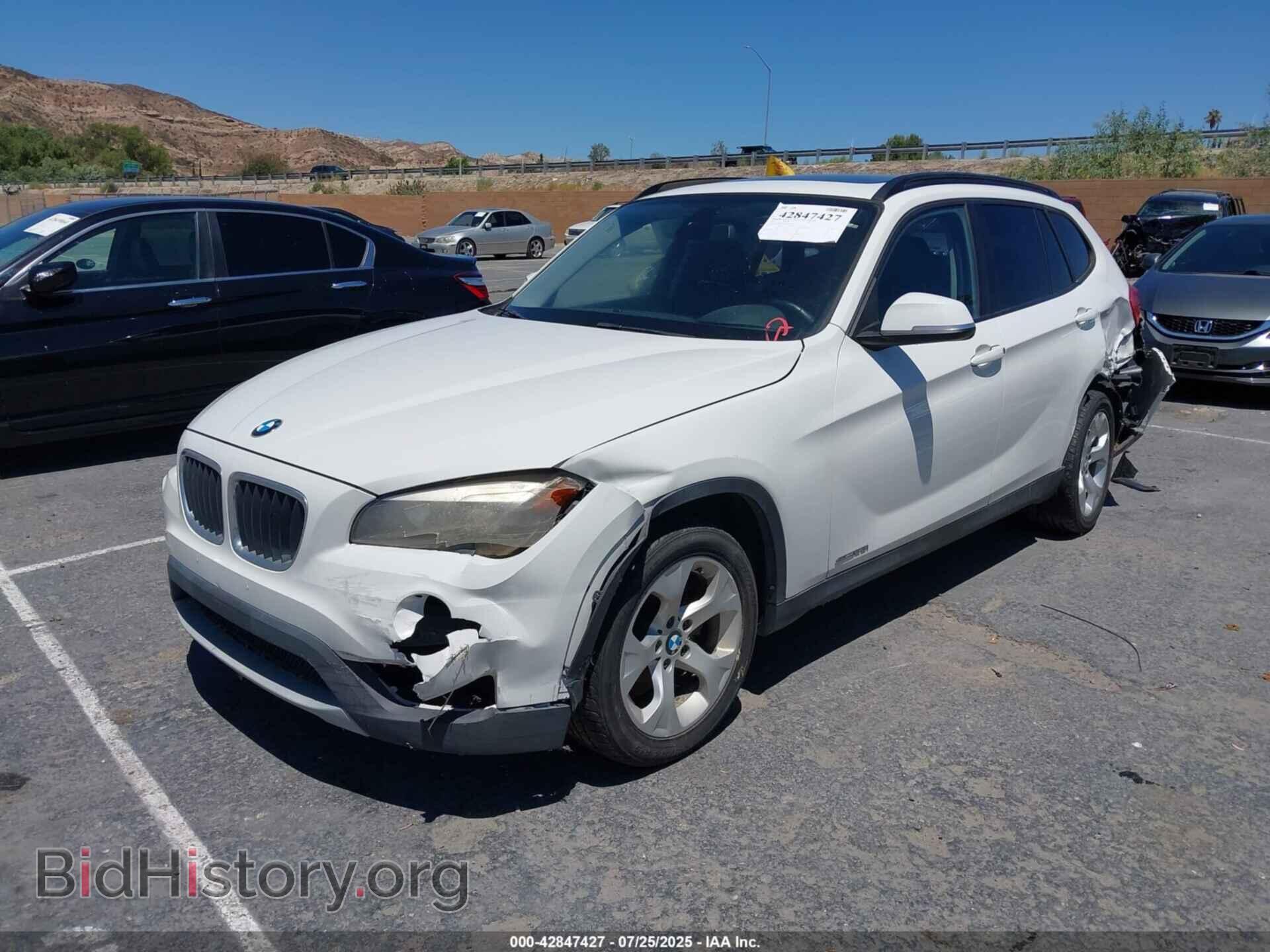 2014 BMW X1 - VIN: WBAVM1C55EVW52739 - Фото 2