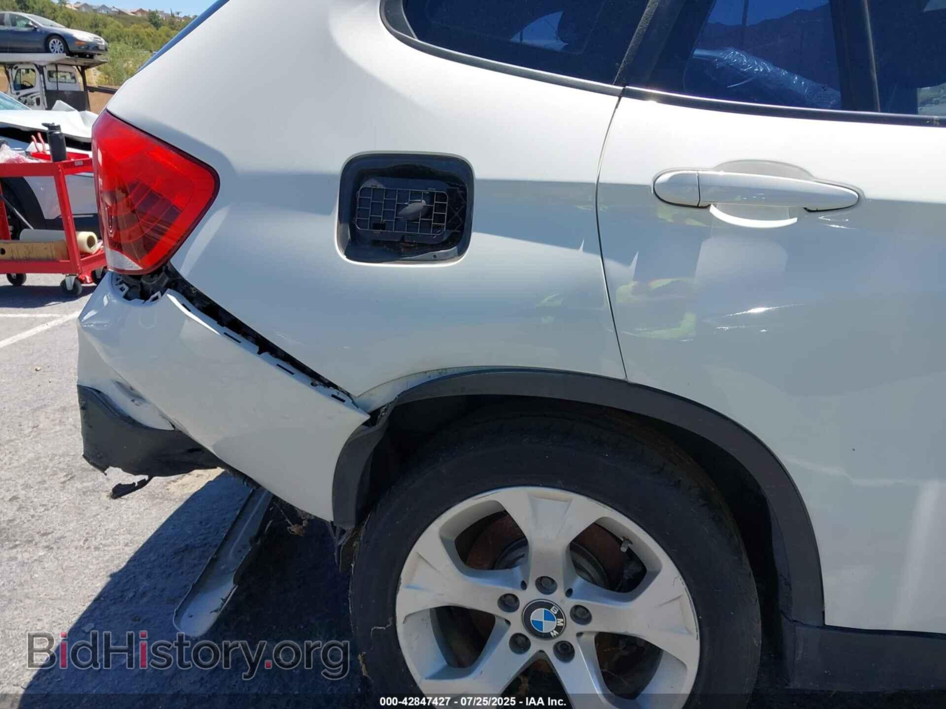 2014 BMW X1 - VIN: WBAVM1C55EVW52739 - Фото 13