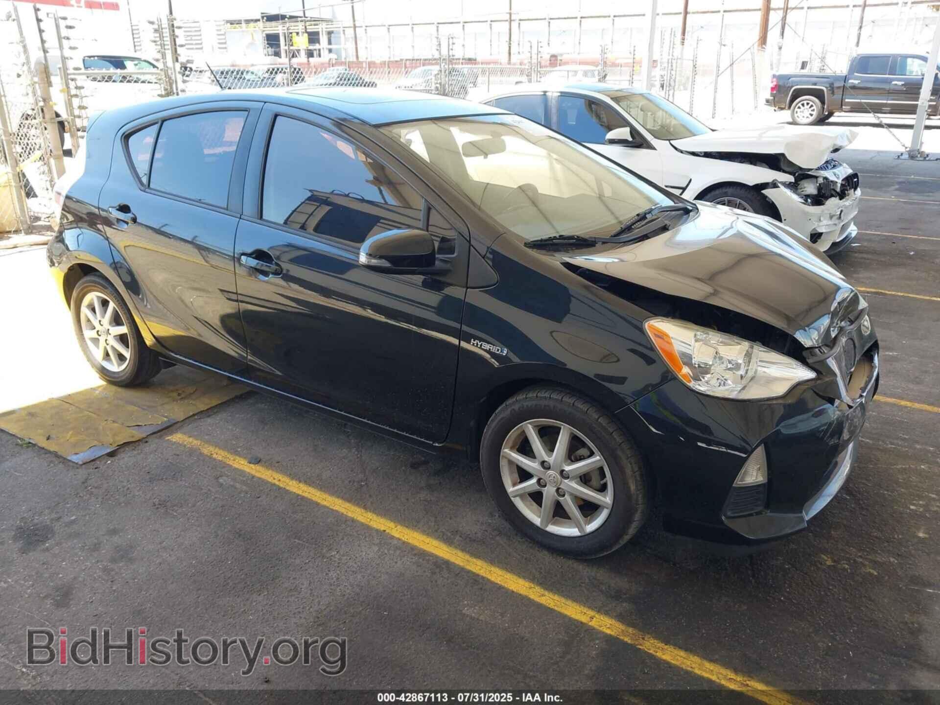 Фотография JTDKDTB37E1069808 - TOYOTA PRIUS C 2014