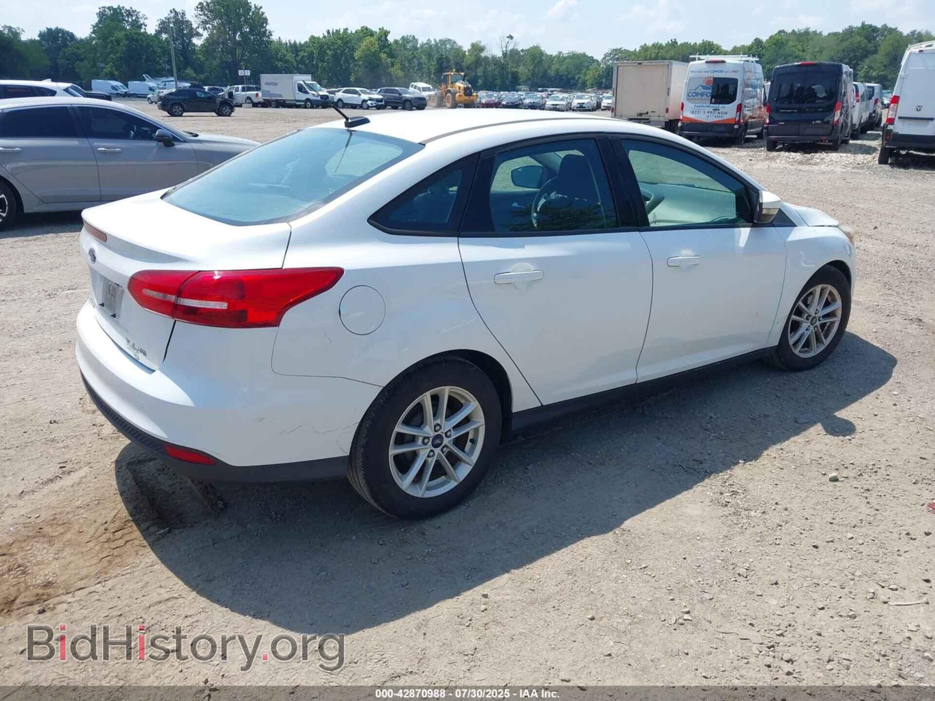 2015 FORD FOCUS - VIN: 1FADP3F2XFL213977 - Photo 4