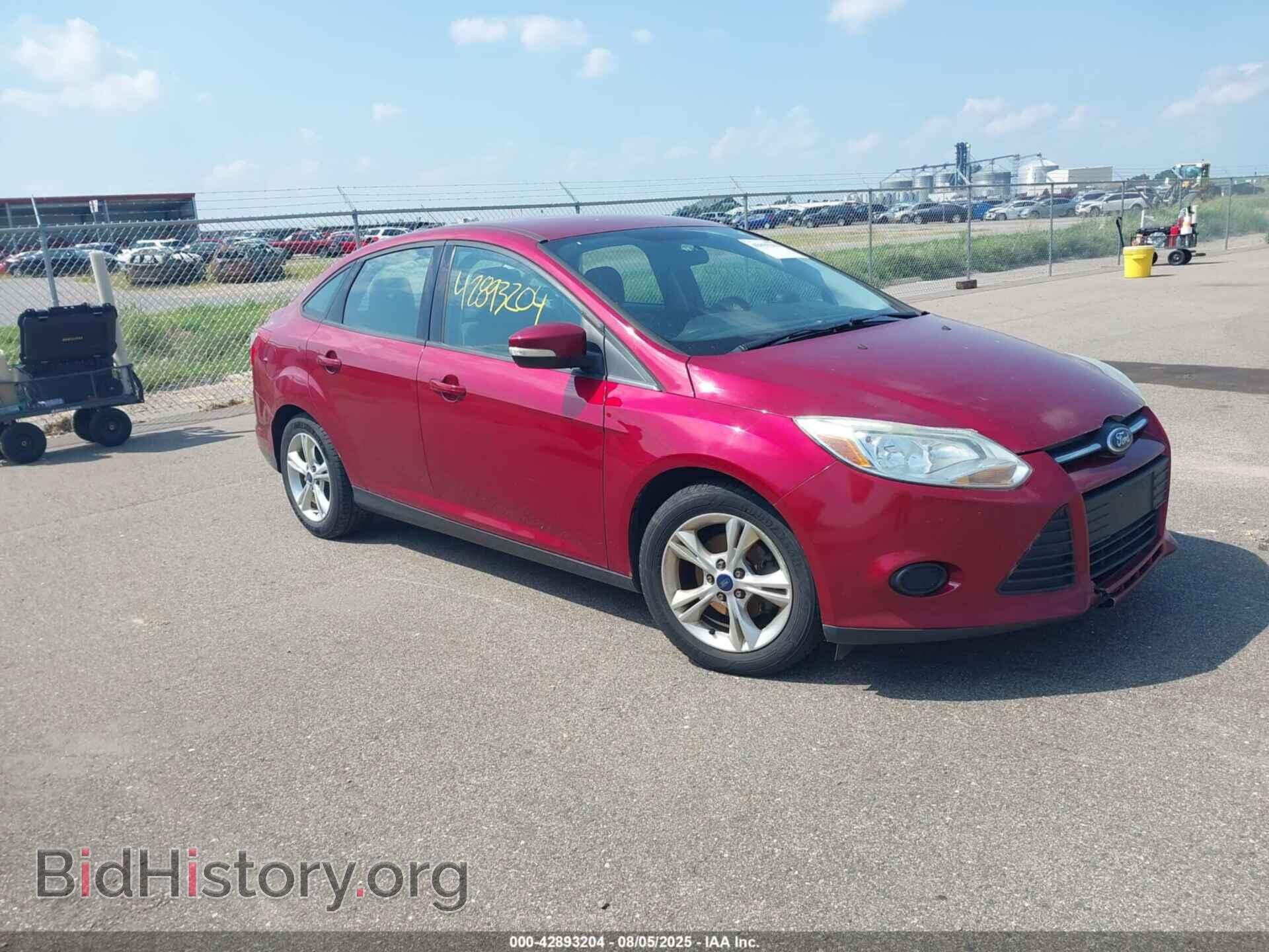 Фотография 1FADP3F26EL198070 - FORD FOCUS 2014