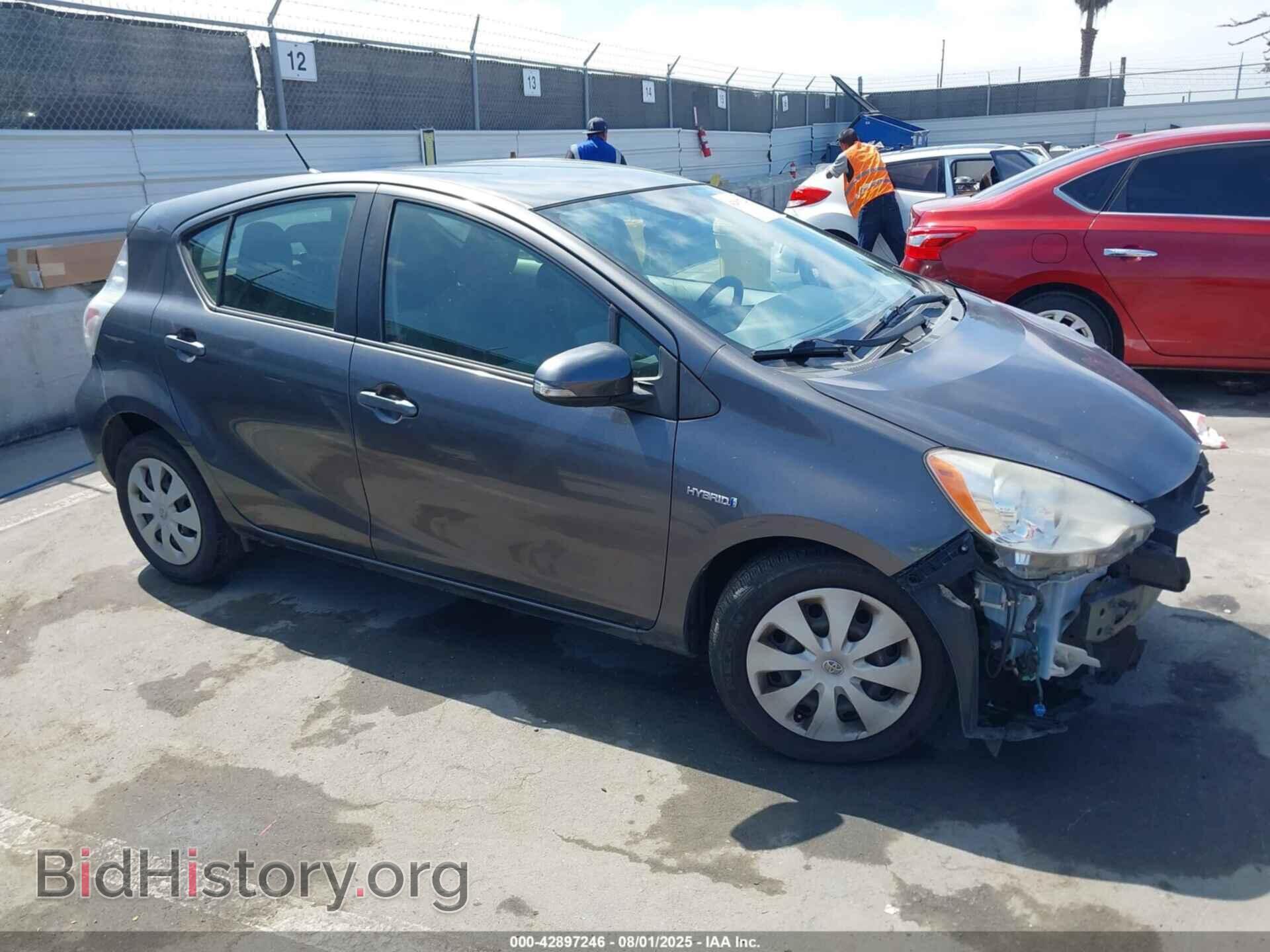 Фотография JTDKDTB33E1557802 - TOYOTA PRIUS C 2014