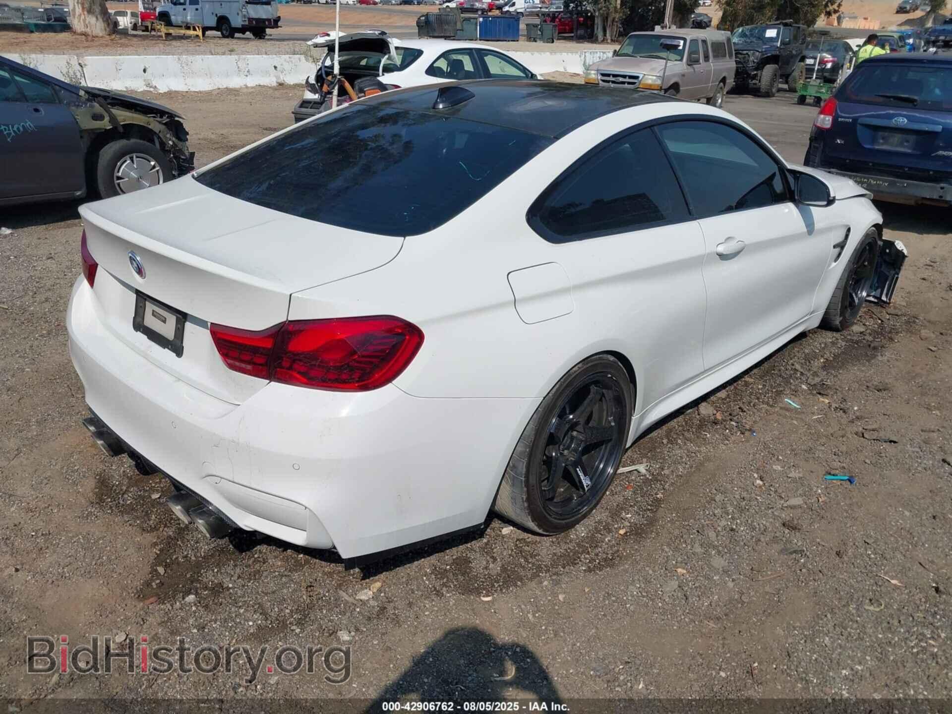 2015 BMW M4 - VIN: WBS3R9C59FK330109 - Фото 4