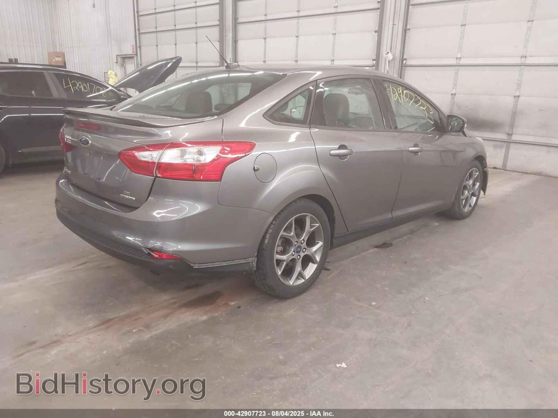 2014 FORD FOCUS - VIN: 1FADP3F27EL209755 - Photo 4