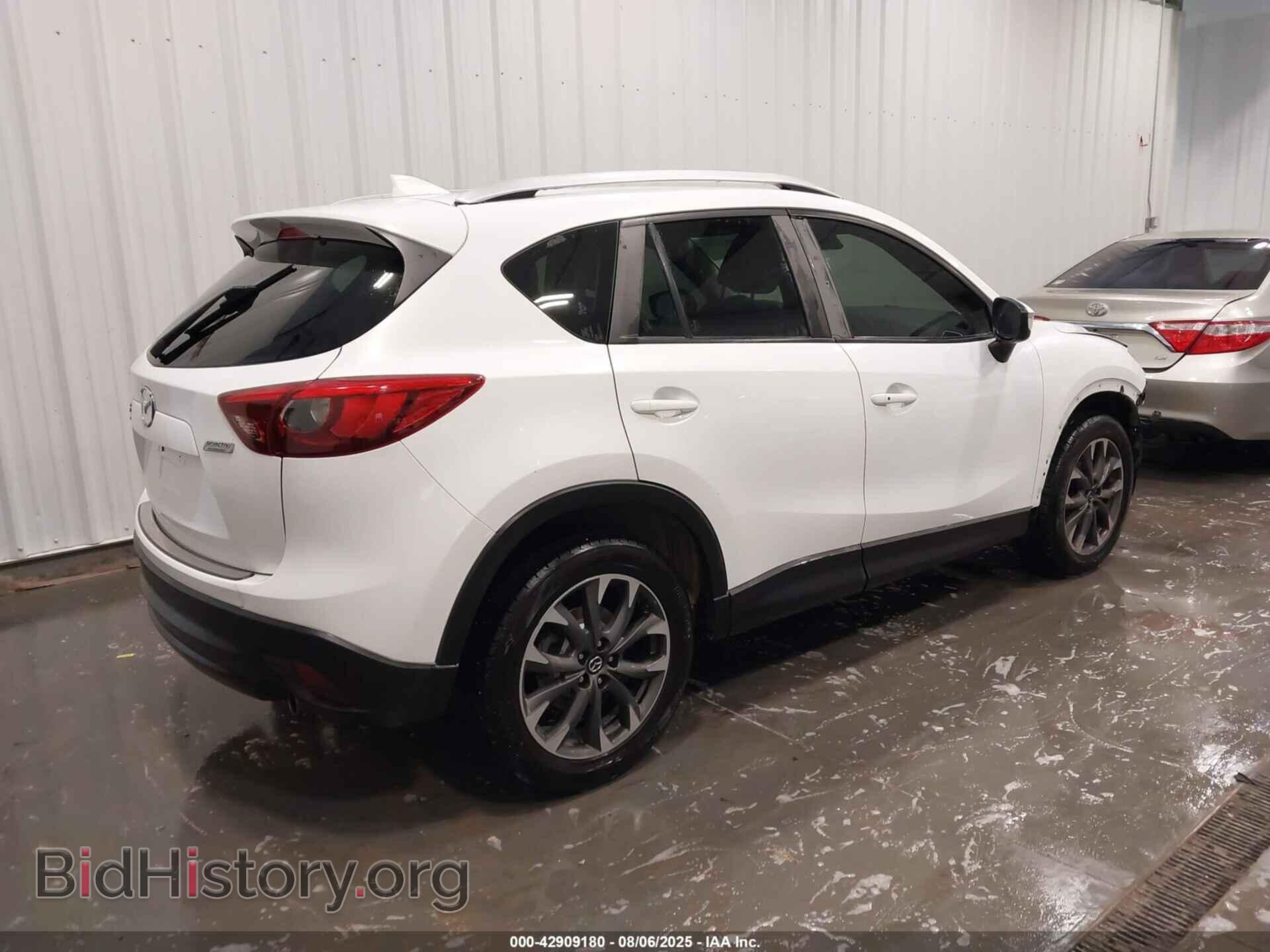2016 MAZDA CX-5 - VIN: JM3KE4DY2G0699053 - Фото 4