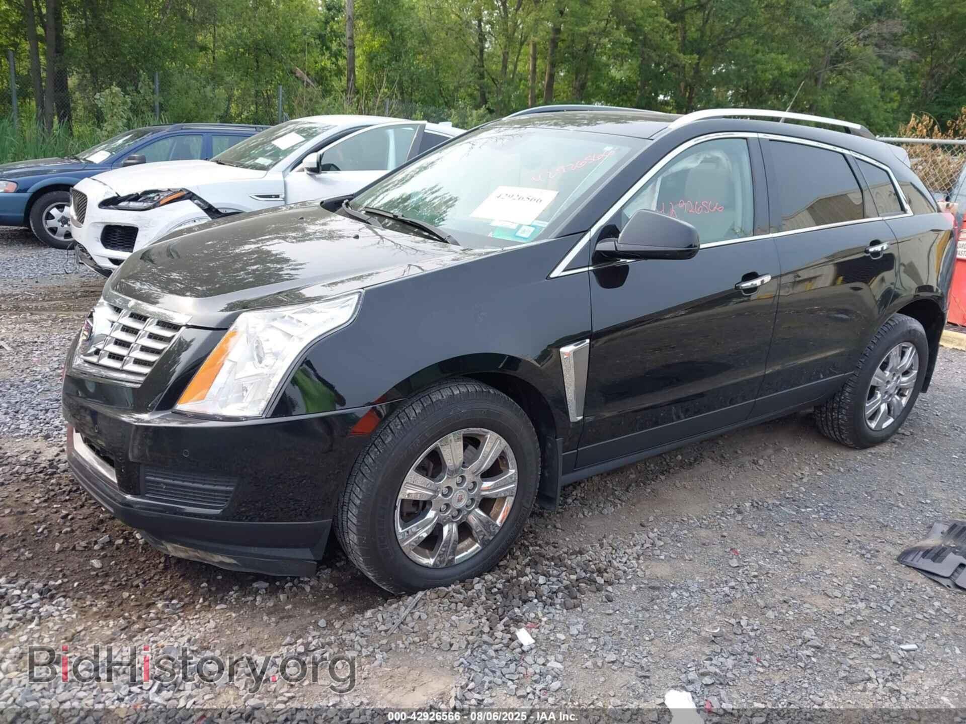 2014 CADILLAC SRX - VIN: 3GYFNBE38ES678452 - Фото 2