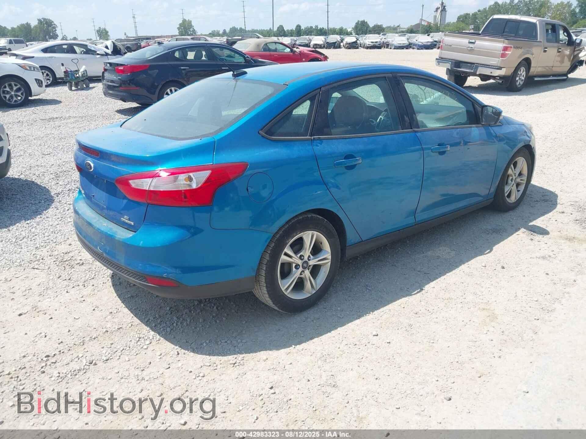2014 FORD FOCUS - VIN: 1FADP3F24EL252871 - Photo 4