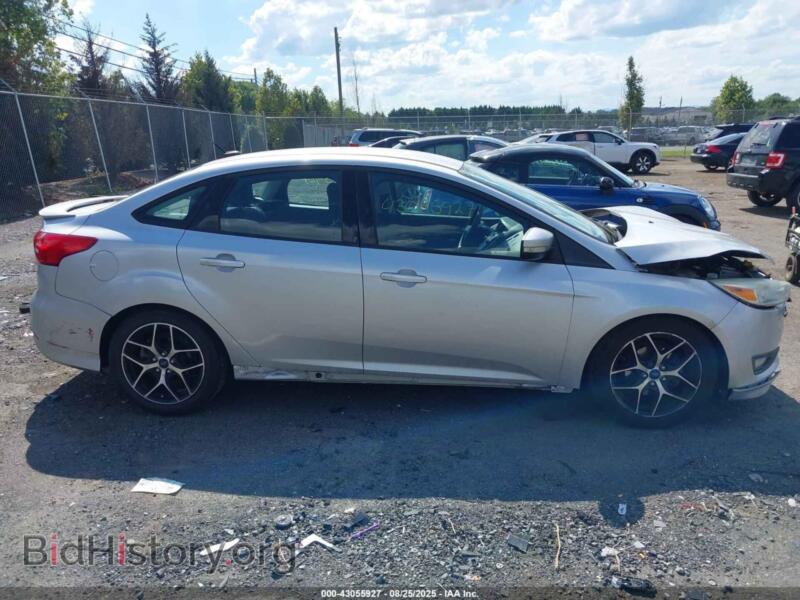2015 Ford FOCUS (VIN 1FADP3F24FL228457) — фото 13 из 16