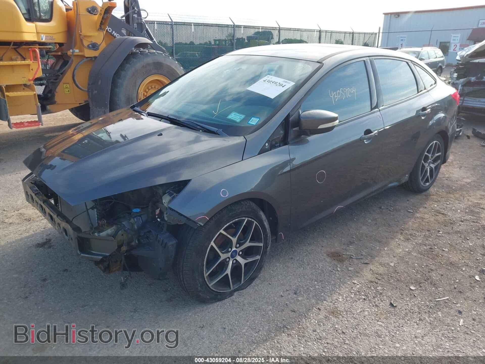 2016 FORD FOCUS - VIN: 1FADP3F2XGL313210 - Фото 2