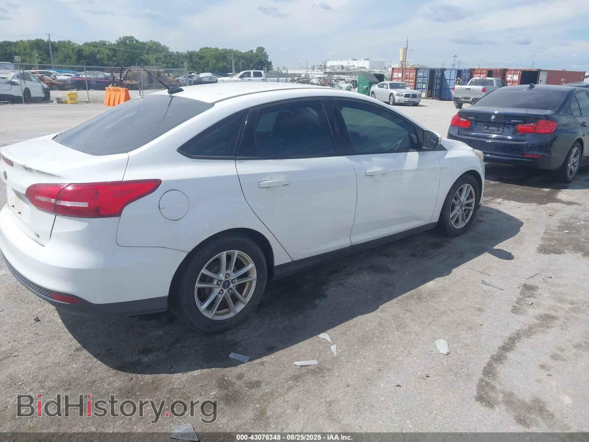 2015 FORD FOCUS - VIN: 1FADP3F21FL207579 - Photo 4