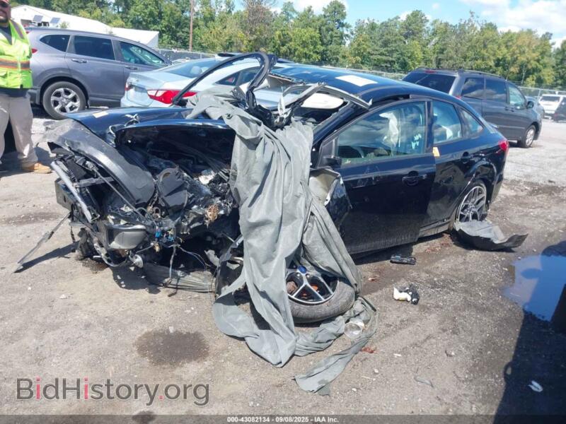 2016 Ford FOCUS (VIN 1FADP3F25GL403297) — фото 2 из 16