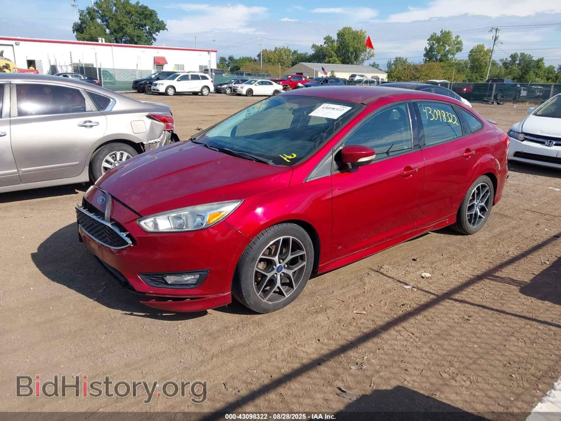 2015 FORD FOCUS - VIN: 1FADP3F21FL247693 - Photo 2