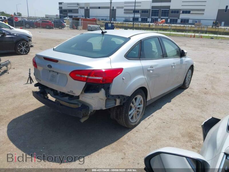 2016 Ford FOCUS (VIN 1FADP3F27GL402152) — фото 4 из 16