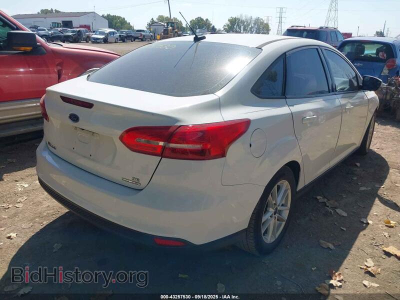2016 Ford FOCUS (VIN 1FADP3F28GL404931) — photo 4 of 16