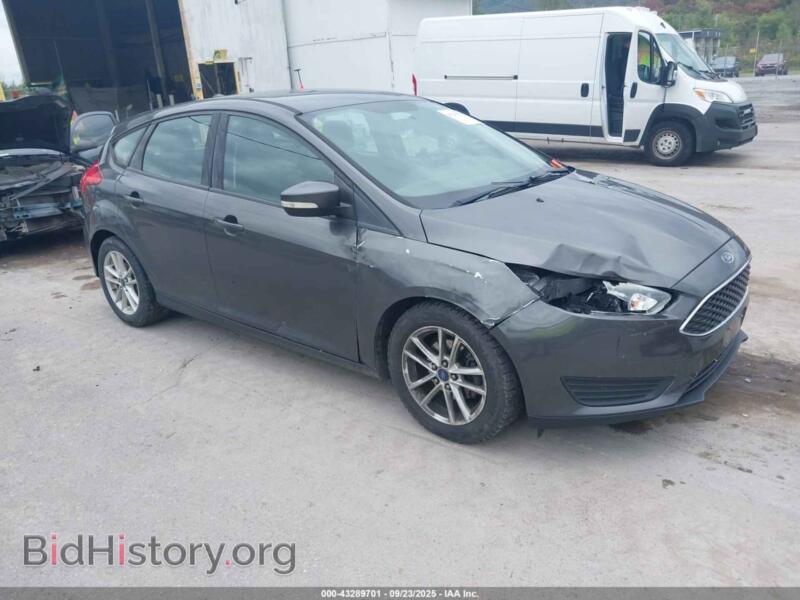 2015 Ford FOCUS SE (VIN 1FADP3K22FL301461) — photo 1 of 11, IAAI, damage: front end