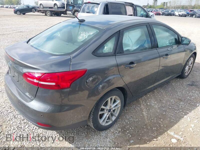 2016 Ford FOCUS (VIN 1FADP3F27GL288539) — фото 4 из 13