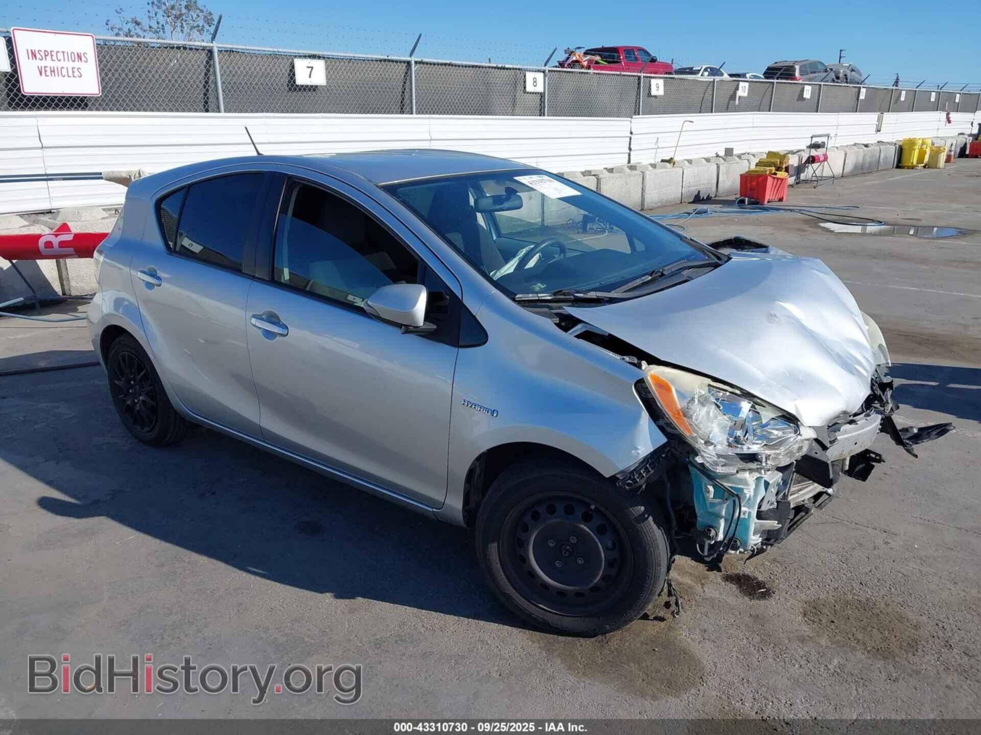 Фотография JTDKDTB38D1549628 - TOYOTA PRIUS C 2013