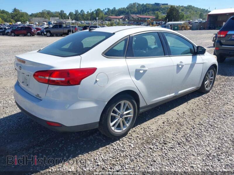 2016 Ford FOCUS (VIN 1FADP3F22GL207124) — фото 4 из 12