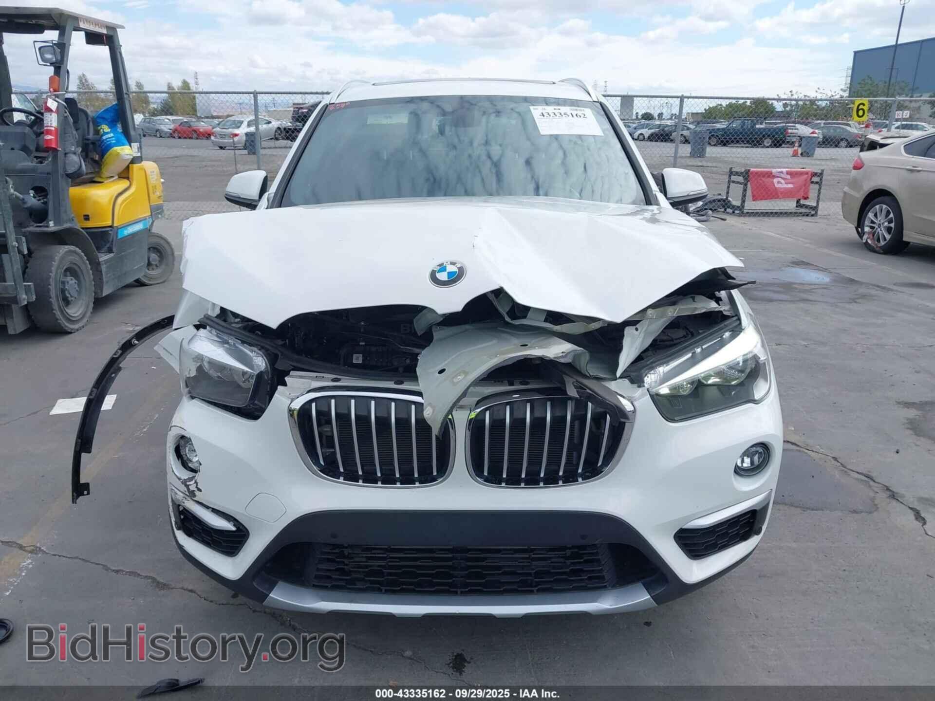 2018 BMW X1 - VIN: WBXHT3C31J5L29217 - Фото 12