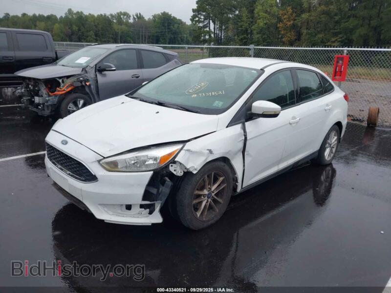 2016 Ford FOCUS (VIN 1FADP3F29GL365542) — фото 2 из 16